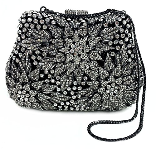 “Poinsettia Eve” Black And Crystal Diamond Studded Designer Clutch/Evening Purse with a Cachet of Prestigious Swarovski Inlaid Crystals. Bordeaux Collection: Includes Platinum, Concealable/Removable 10″” Snake Chain, Hard Case, 2″” Opening With Magnetic Closures and Sturdy Platinum Hinges. Rich Silver Leather Inner Lining. Black Velvet Storage Bag With Draw-String Closure, Sleek, Black Storage Box and Extra Replacement Jewels. “